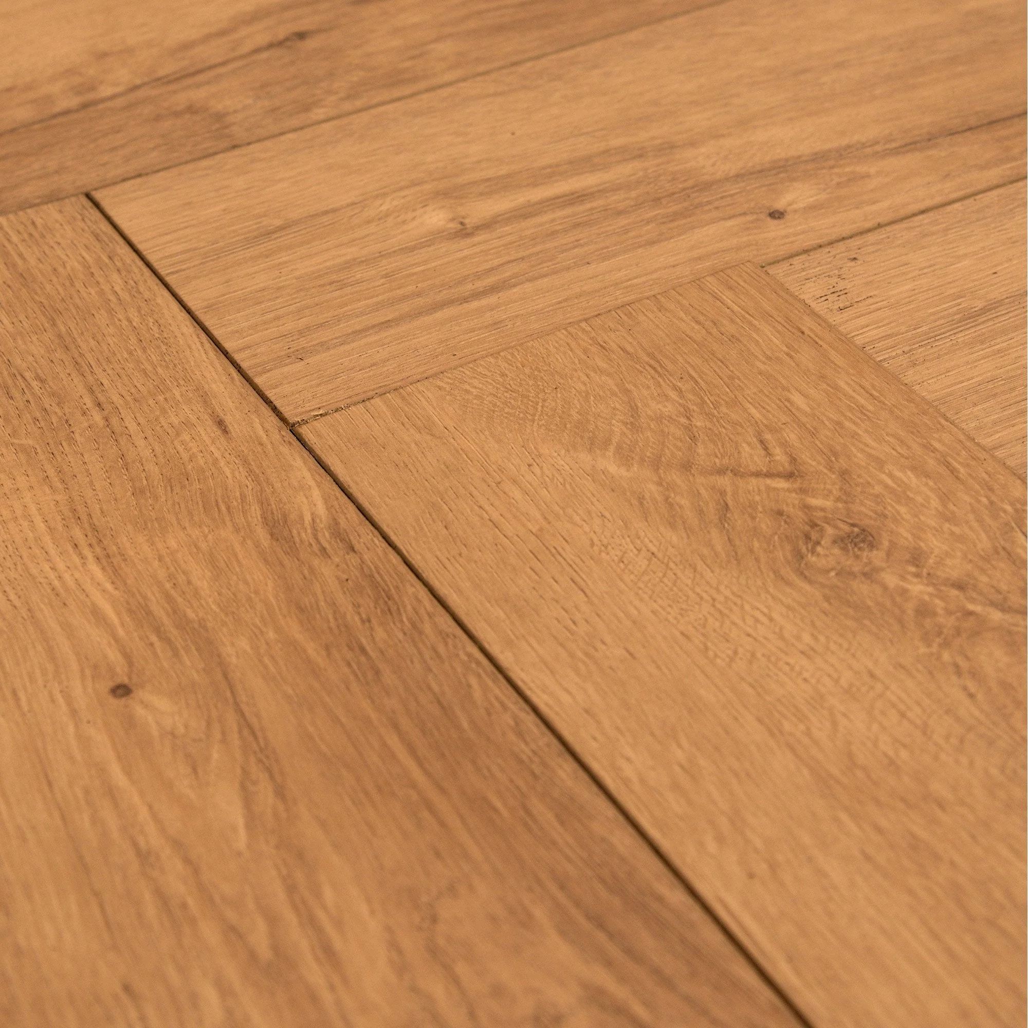 Warm Harvest Oak - Comfort Luxe 12mm Laminate Herringbone Flooring - Image 3