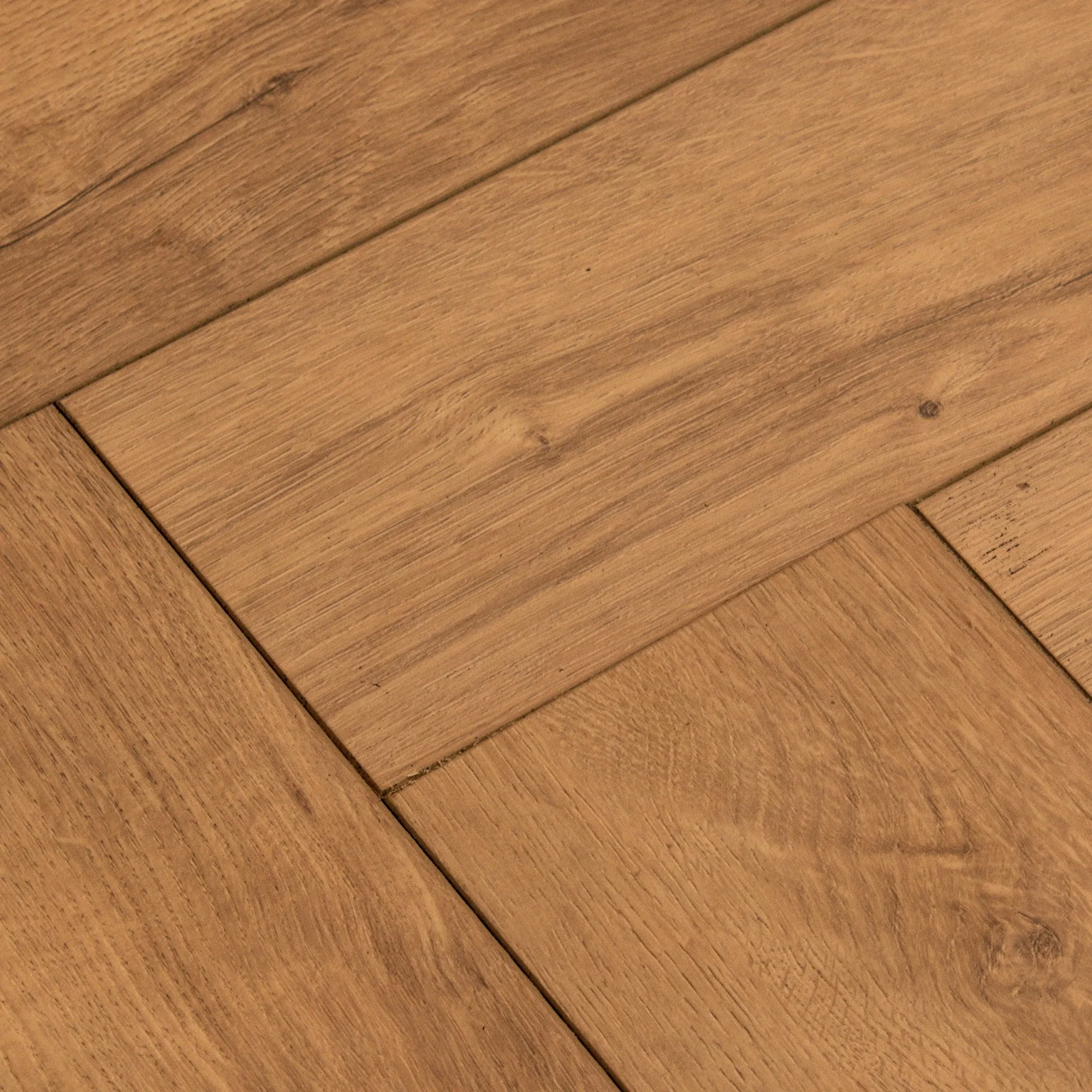 Warm Harvest Oak - Comfort Luxe 12mm Laminate Herringbone Flooring - Image 4